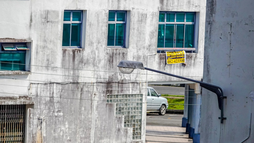 For-sale sign on a commercial building