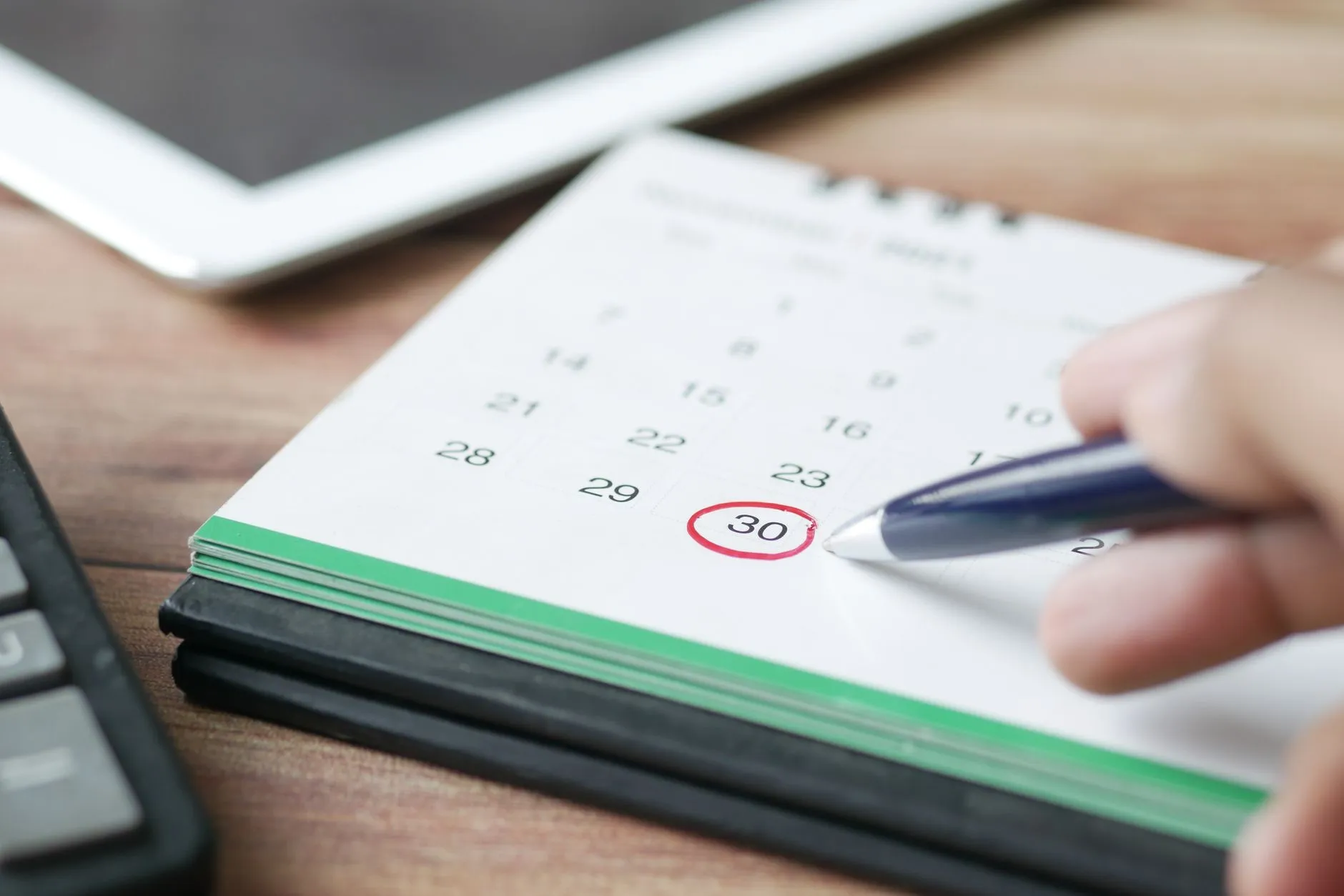 Calendar with December deadline marked for HVAC acquisition year-end closing timeline