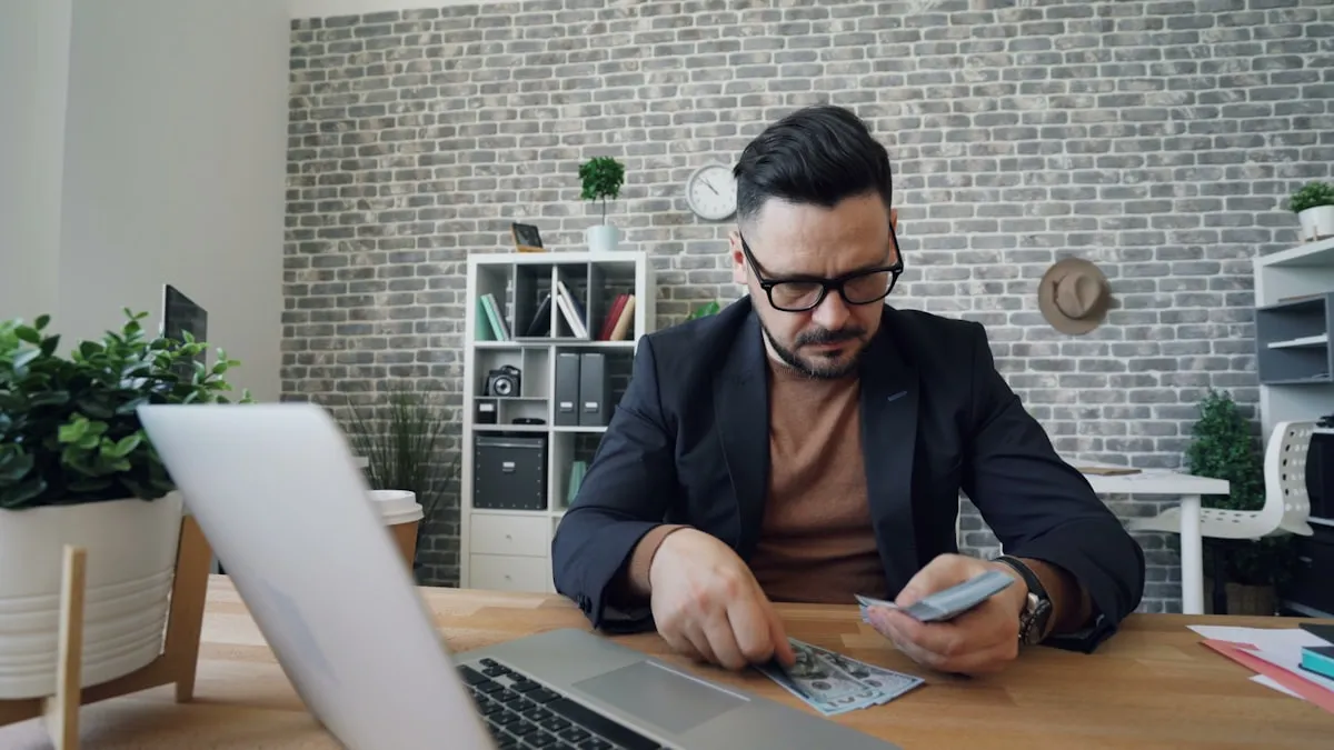 Business owner reviewing bank statement documents at office desk